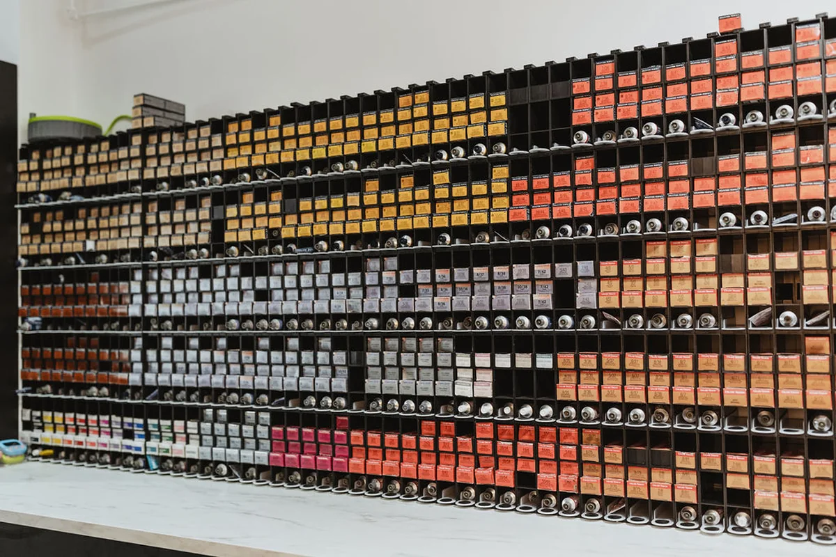 Professional colour shades arranged at the salon colour bar