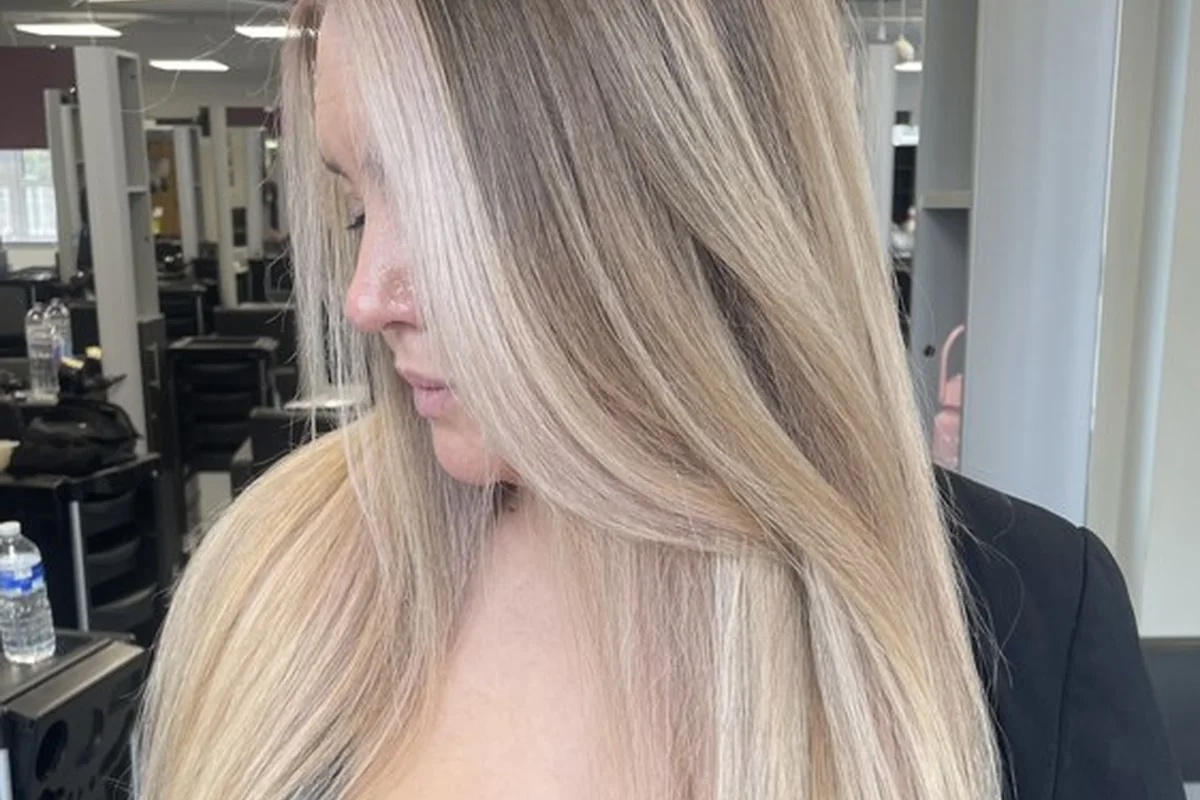 Bright blonde hair with a smooth straight finish