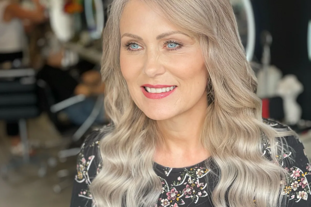 Soft silver-blonde hair with face-framing layers