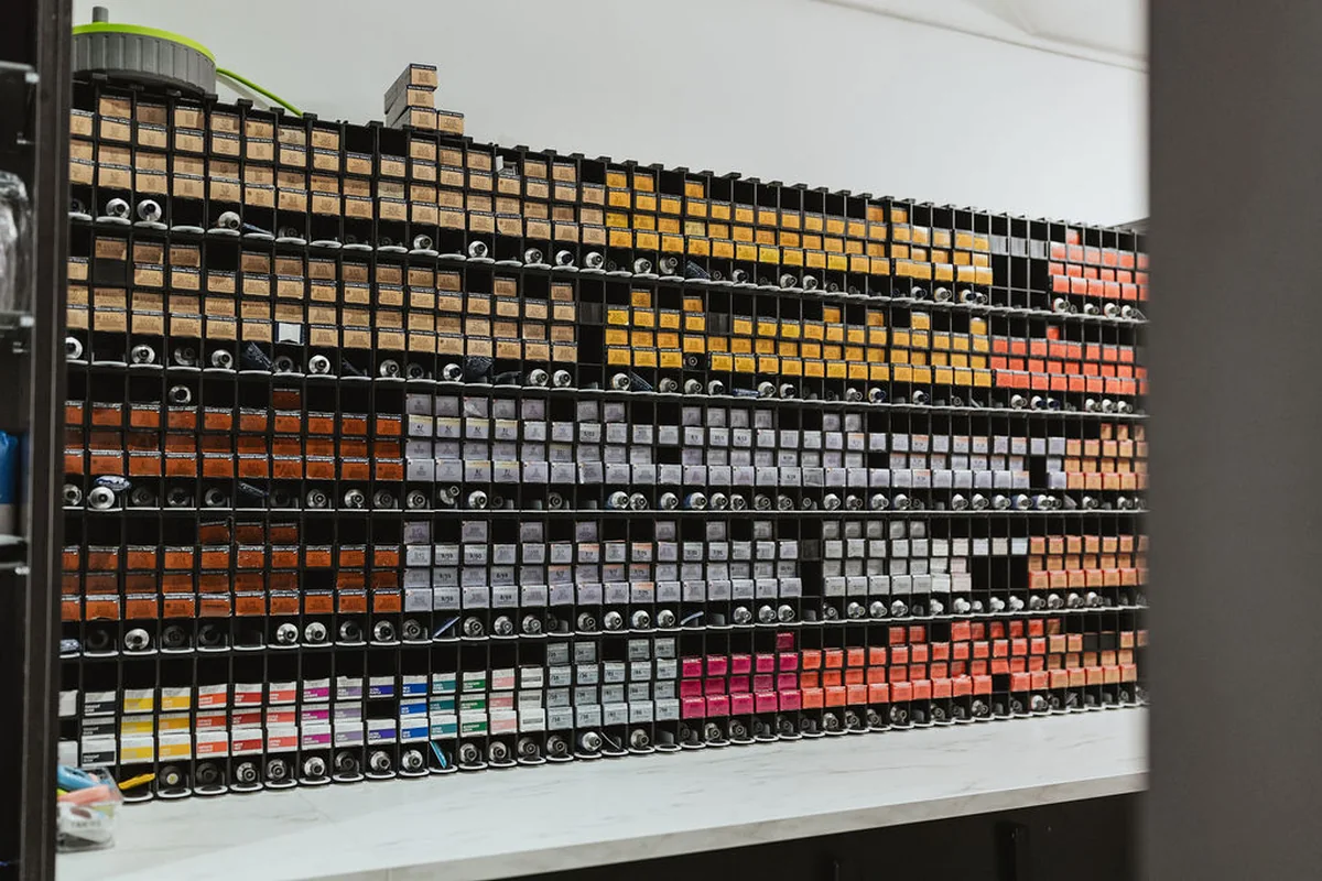 Rows of professional hair colour at the salon colour bar