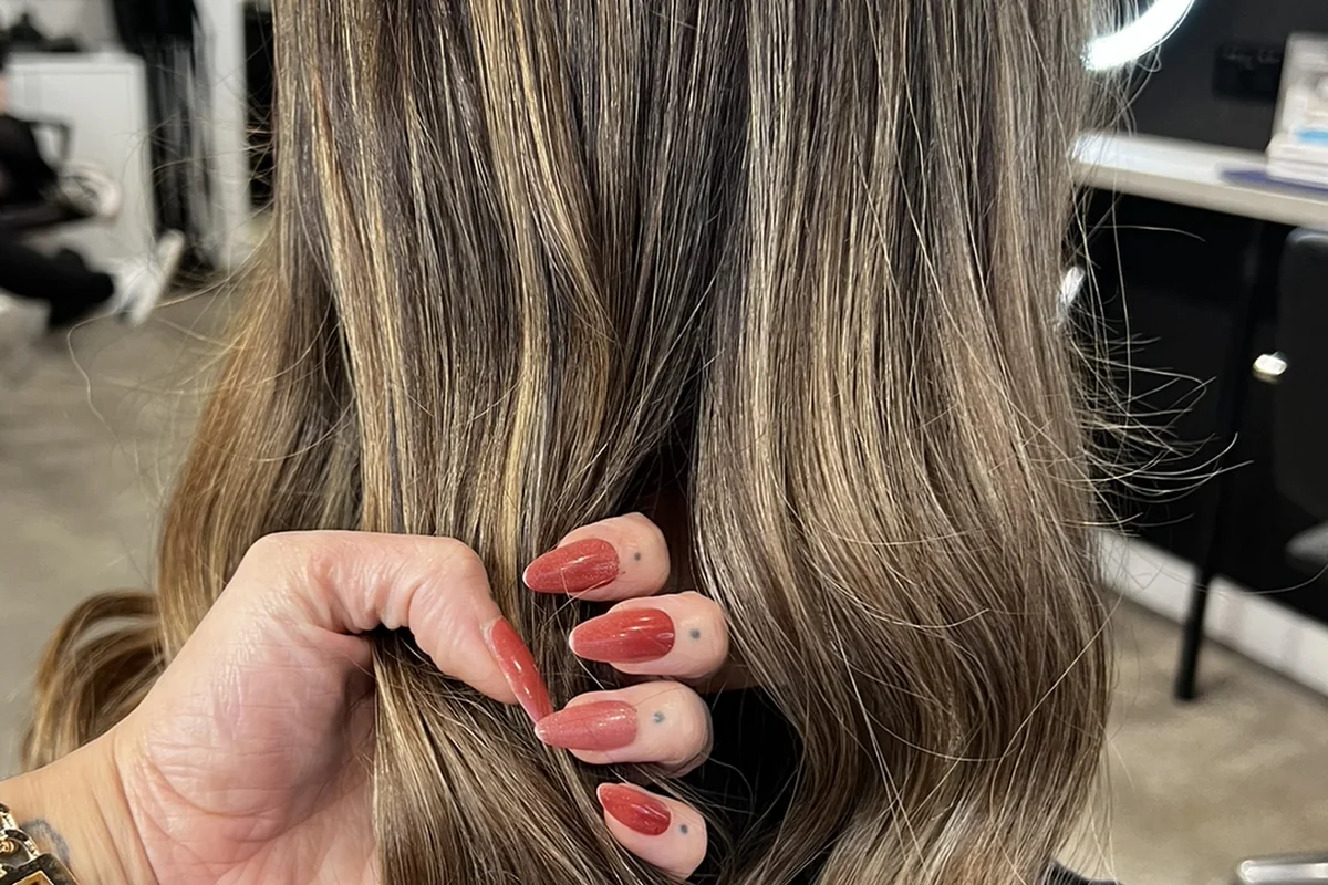 A close view of dimensional brown and blonde waves