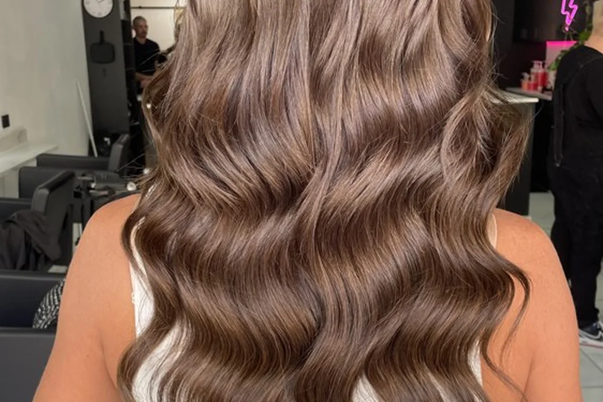 Long softly waved hair viewed from the back