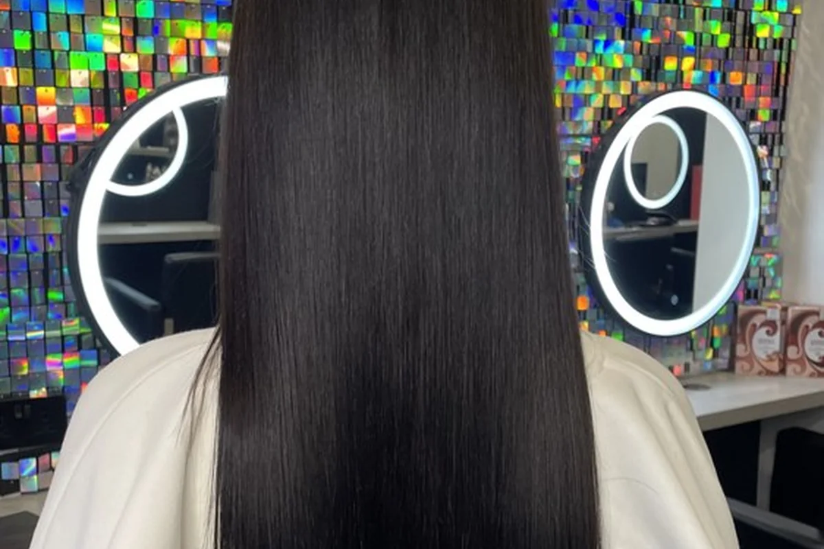 Long dark hair with a sleek, smooth finish