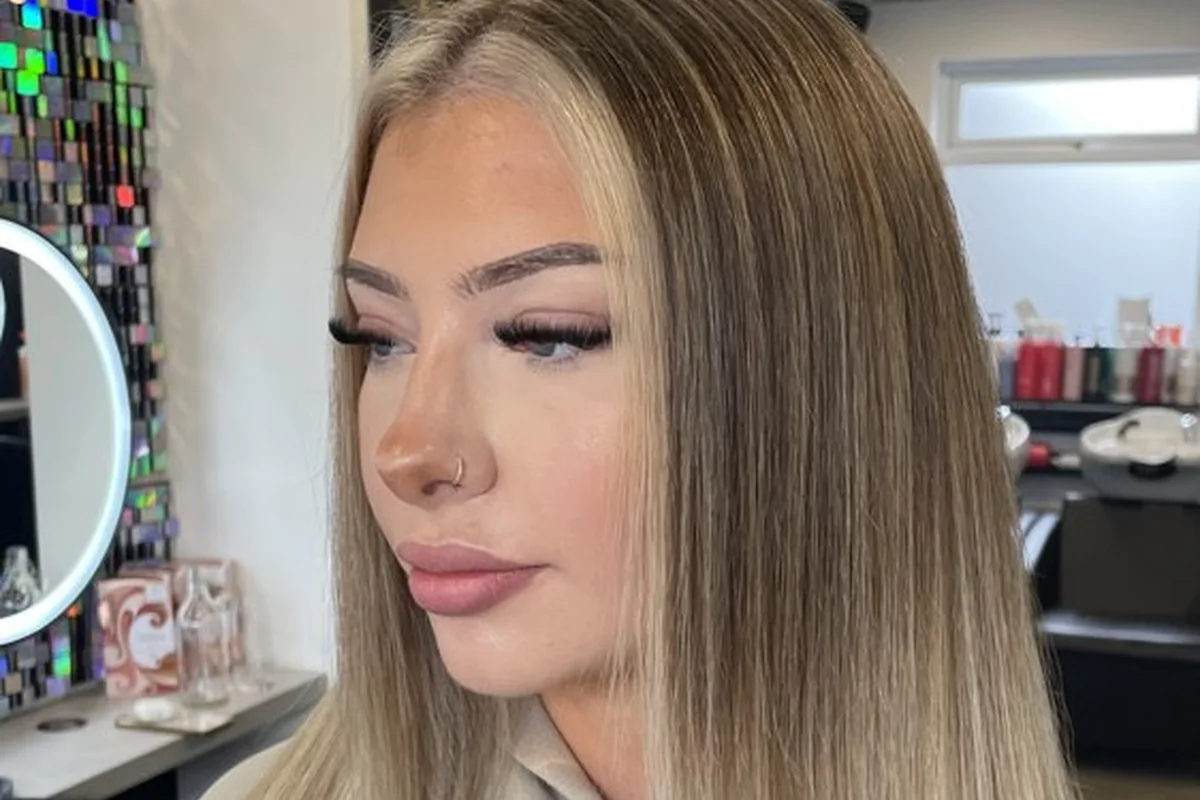 A smooth blonde finish with a soft darker root