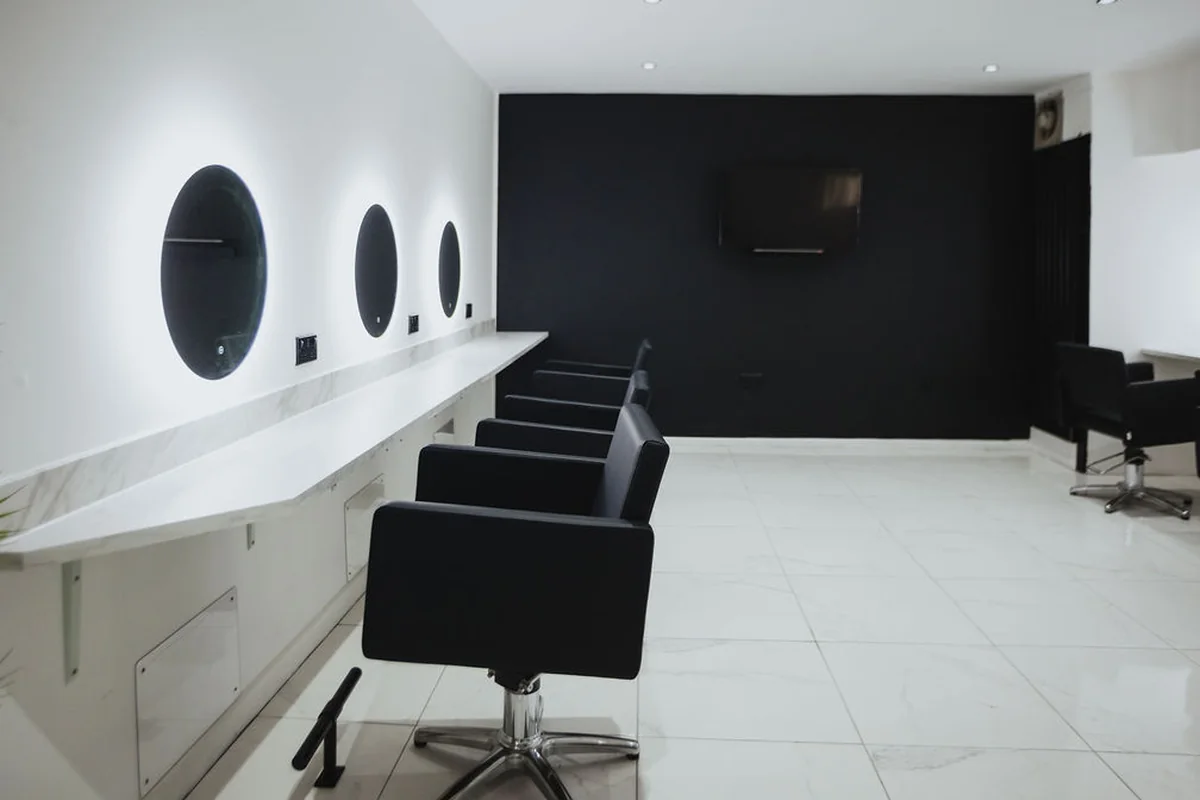 A quieter styling space with individual chairs and mirrors