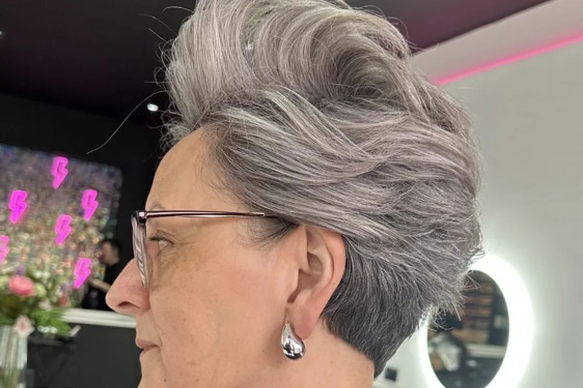 Silver pixie haircut with height through the top