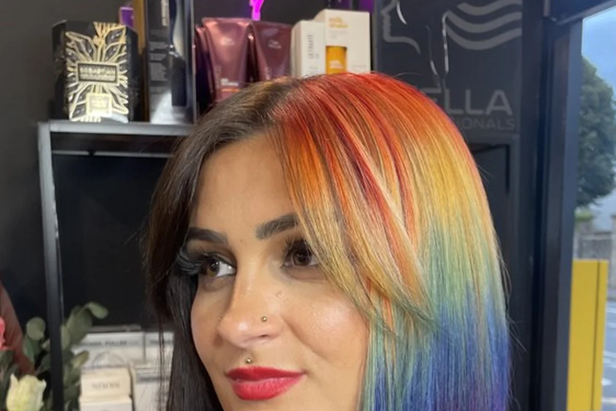 A vibrant rainbow-coloured bob photographed in the salon