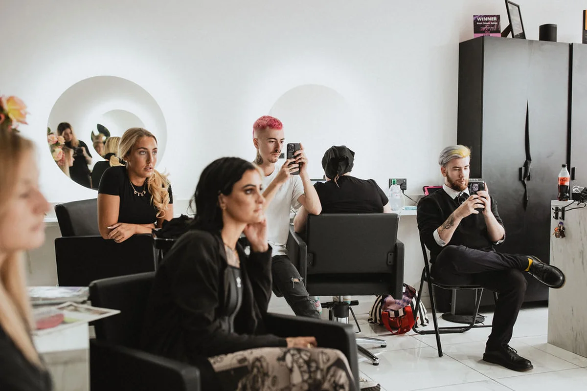 The salon team working with clients during a busy day